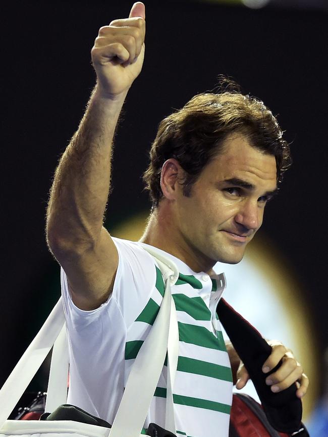 Roger Federer gestures to the crowd after losing against Novak Djokovic in Melbourne in 2016. Picture: AFP