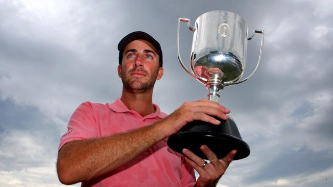 Geoff Ogilvy holds aloft the Kirkwood Cup after winning it in 2008.