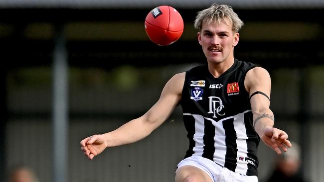 Darley’s Mitch Ward kicks the ball to a target against Melton South last season. Picture: Andy Brownbill