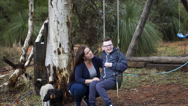 10-06-18 - Amanda-Jane Reed with her son Taj Dixon (12) who has cerebral palsy, autism and low vision. Taj does occupational and speech theraphy every week. PHOTO: MARIE NIRME