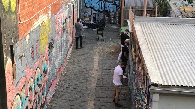 Revellers have been urinating in an alleyway near apartments in Anchor Place, Prahran. Picture: Supplied.