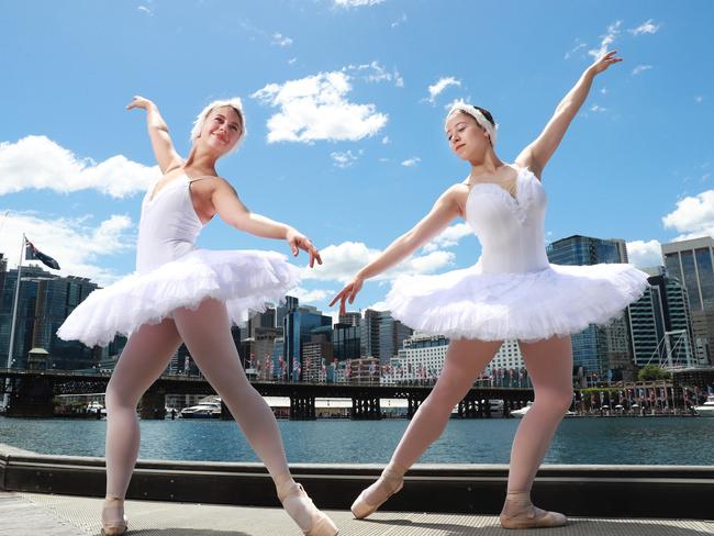 27/10/22: Iryna Khutori-Anska(brunette) and Anastasiia Mirraslavaska(blonde) from the United Ukranian Ballet at Darling Harbour. The two dancers will be performing Swan Lake in Sydney while their homeland is under attack by Russia. John Feder/The Australian.