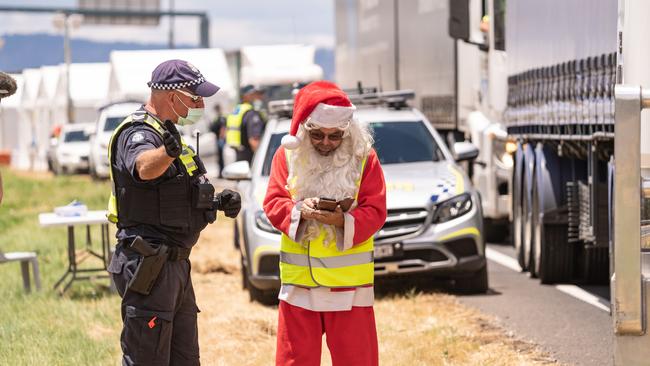 Santa was having problems filling out his border pass. Picture: Simon Dallinger