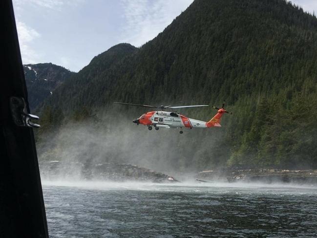 US Coast Guard crews responding to the mid-air collision. Picture: AAP