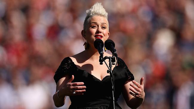 Katie Noonan performs the Australian national anthem during the 2022 AFL Grand Final match between the Geelong Cats and the Sydney Swans. Picture: Getty