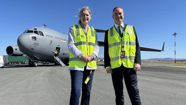 Federal Member for Franklin Julie Collins and Hobart Airport CEO Norris Carter in front of a Royal Australian Air Force Boeing C-17A Globemaster III. Picture: Simon McGuire.