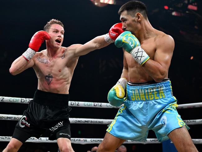 Janibek Alimkhanuly (blue and yellow) v Andrei Mikhailovich (black) at the No Limit- Fight Night at The Star on the 4th October 2024 . Picture: No Limit Boxing