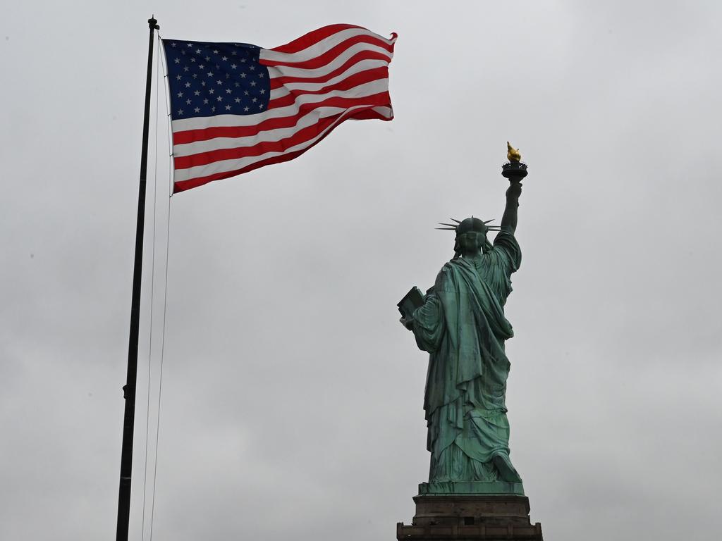 The words inscribed at the Statue of Liberty have become the latest cultural battleground in the US. Picture: TIMOTHY A. CLARY / AFP.