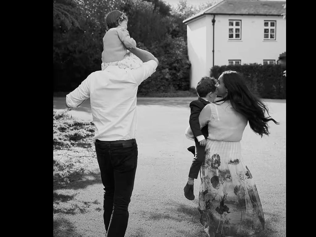 Prince Harry and Meghan Ms Markle walk with their children towards Frogmore Cottage. Picture: Netflix