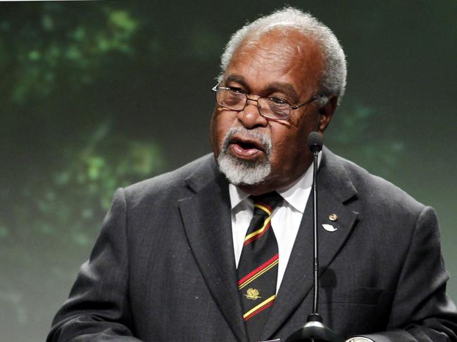 27/05/2010 WIRE: (FILES) In a file picture taken on May 27, 2010 New Guinean Prime Minister Michael Somare addresses the Climate and Forest Conference in Oslo. Veteran Papua New Guinea leader Sir Michael Somare declared September 1, 2011 he is still the Pacific nation's prime minister despite his family announcing his retirement while he was ill. AFP PHOTO / FILES / Hakon Mosvold Larsen