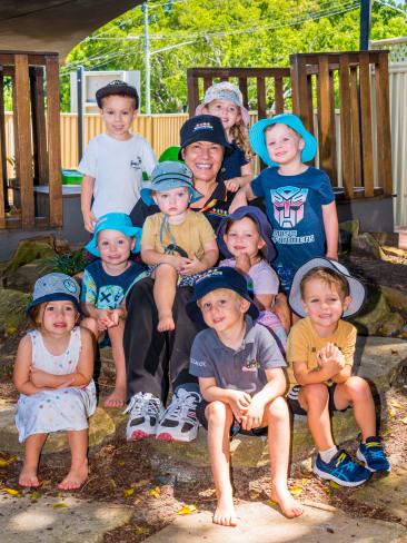 Miss Rosie with children from Community Kids Broadbeach. She has been awarded for her commitment as an educator