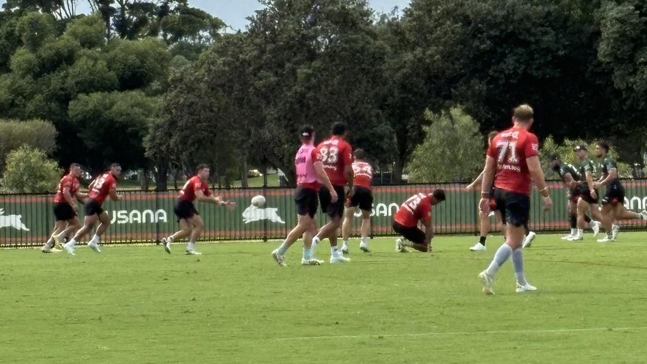 Dean Hawkins (about to catch ball) trains at halfback for the Rabbitohs on Monday. Picture: Pamela Whaley