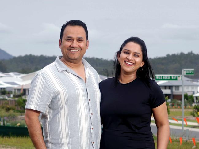 FOR THIS SATURDAY'S COURIER-MAIL PROPERTY SPREAD - Nurse Gracious Dantas and his wife Lucilia Gomes, on the block where they are building there new house. They have owned investment properties and are building a new one, for top occupations for property investors, White Rock - on Wednesday 16th of October 2024 - Photo Steve Pohlner