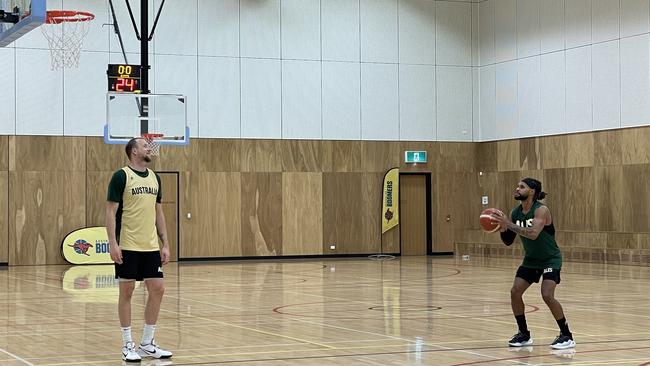 Joe Ingles and Patty Mills banter after Boomers practice.