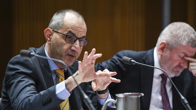 Secretary of the Department of Home Affairs Mike Pezzullo, left, speaks during a Senate estimates hearing at Parliament House. Picture: AAP