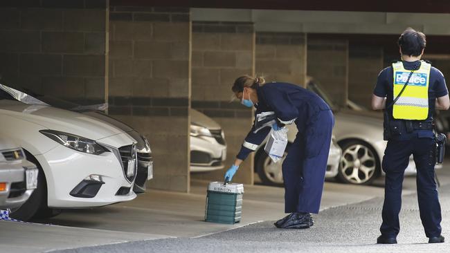 Police and forensics at the scene of a woman’s death in Richmond. Picture: Daniel Pockett