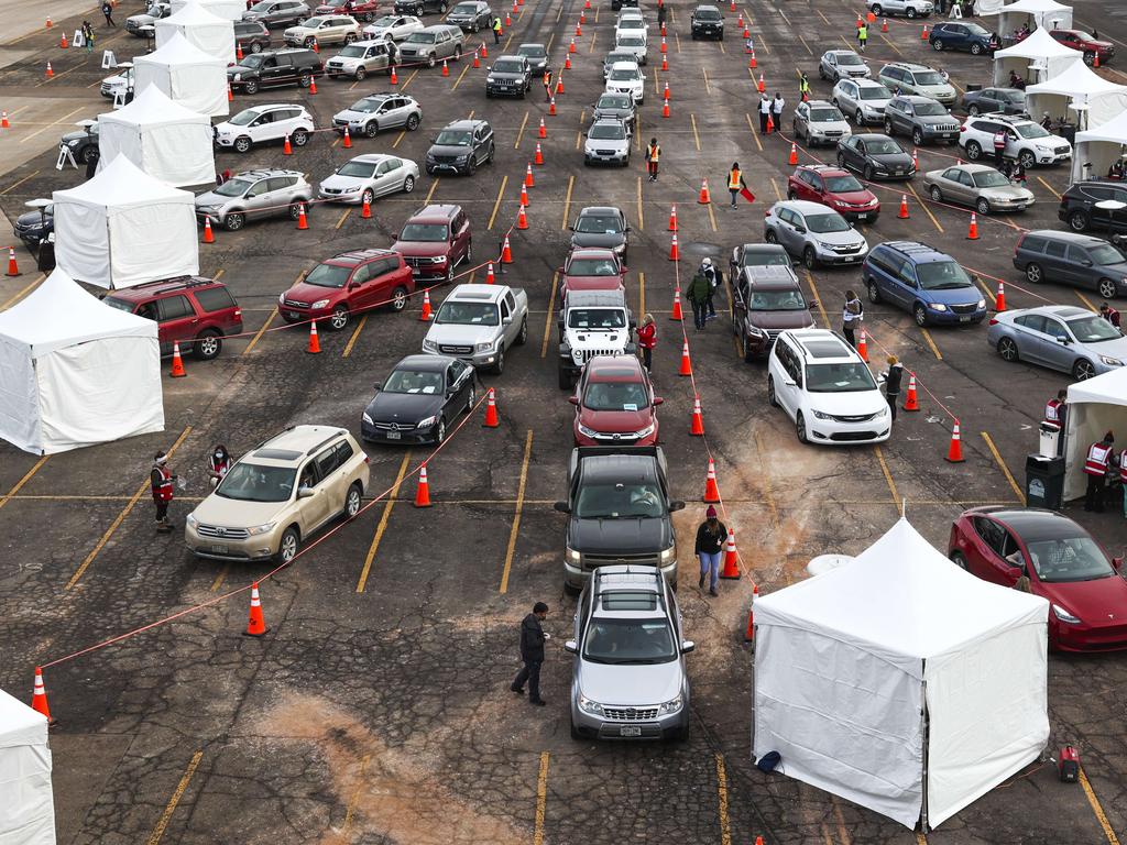 People drive their cars to medical tents at a mass COVID-19 vaccination event on January 30, 2021 in Denver, Colorado. Picture: Michael Ciaglo/Getty Images/AFP