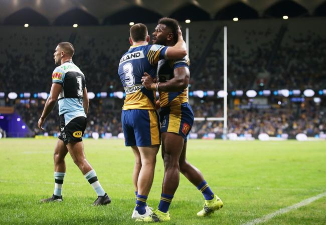 Maika Sivo of the Eels celebrates with team mates after scoring a try (Photo by Matt King/Getty Images)