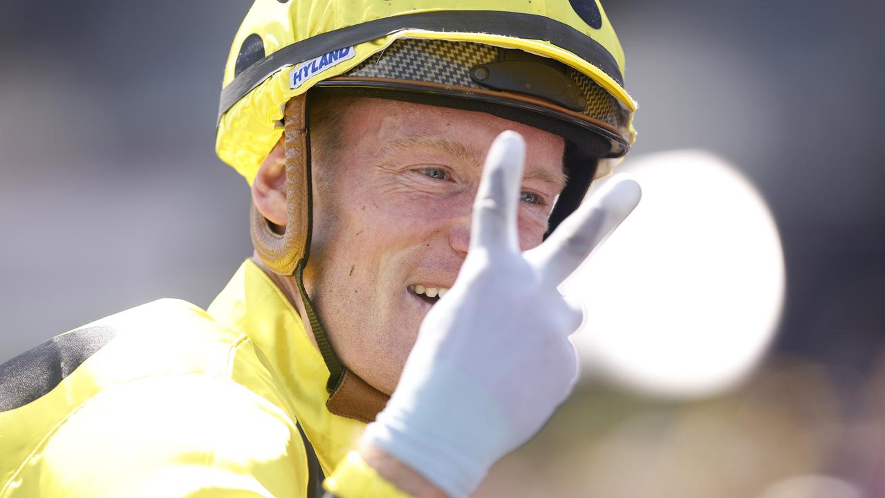 MELBOURNE, AUSTRALIA - NOVEMBER 07: Mark Zahra riding Without A Fight celebrates winning Race 7, the Lexus Melbourne Cup during Melbourne Cup Day at Flemington Racecourse on November 07, 2023 in Melbourne, Australia. (Photo by Daniel Pockett/Getty Images)