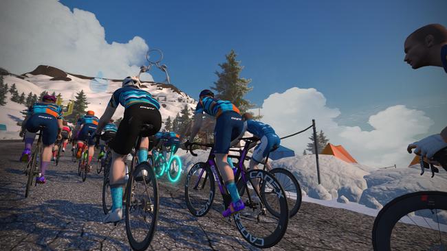 The technology syncs with your home trainer bike, meaning it’s harder to pedal when you’re going up a hill online. Picture: Supplied