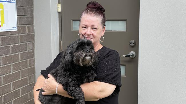 Kellie Hodge and Bear the King Charles cross were allegedly robbed by teens near their Pimpama home. Picture: Charlton Hart