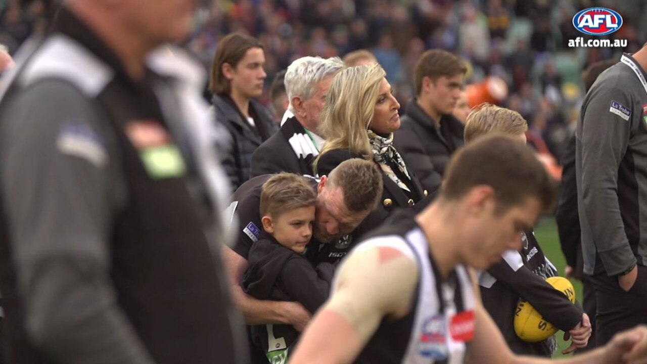 Collingwood coach Nathan Buckley consoles his family after West Coast won the 2018 AFL Grand Final.