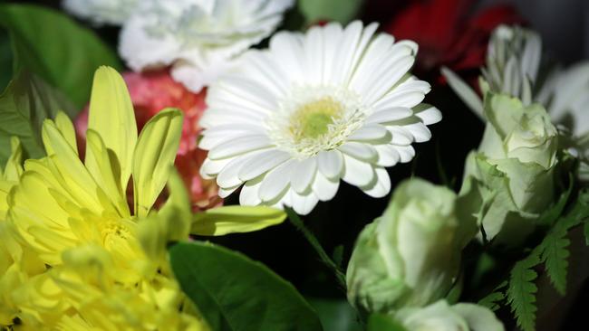 Flowers left at a vigil in memory of Rita. Picture: Christian Gilles