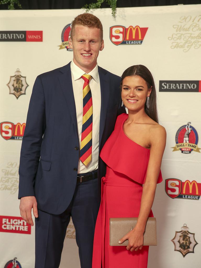 Crows’ Reilly O’Brien with Chloe Swale. Picture: Dean Martin