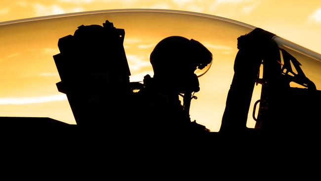 As the sun begins to set at Nellis Air Force Base, Nev., Oregon Air National Guard Lt. Col. Nick Rutgers, assigned to the 123rd Fighter Squadron, 142nd Fighter Wing, prepares his F-15 Eagle for a late day sortie, June 8, 2017. Over 120 Oregon Air Guardsmen are supporting the Weapons Instructor Course during their three-week duty assignment. (U.S. Air National Guard photo by Master Sgt. John Hughel)