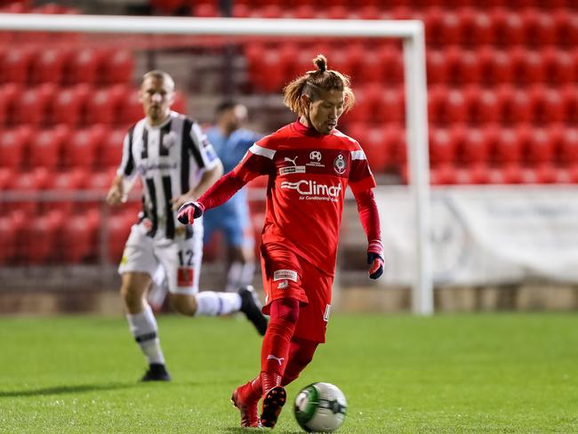 Campbelltown City’s Yohei Matsumoto, who was named man of the match, with the ball during the men’s Premier League soccer grand final. PICTURE: ADAM BUTLER