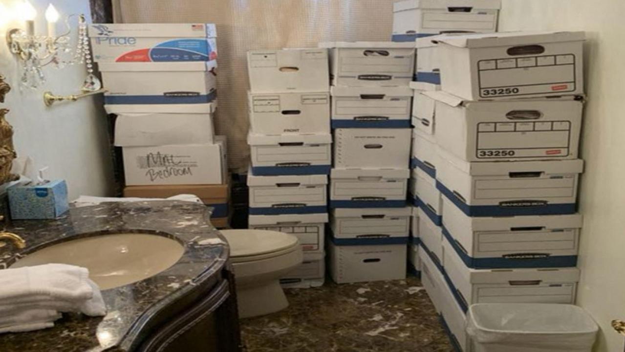 This undated file image, released by the US District Court Southern District of Florida, attached as evidence in the indictment against former US president Donald Trump shows stacks of boxes in a bathroom and shower allegedly in the Lake Room at Mar-a-Lago, the former president's private club. Picture: US Department of Justice / AFP