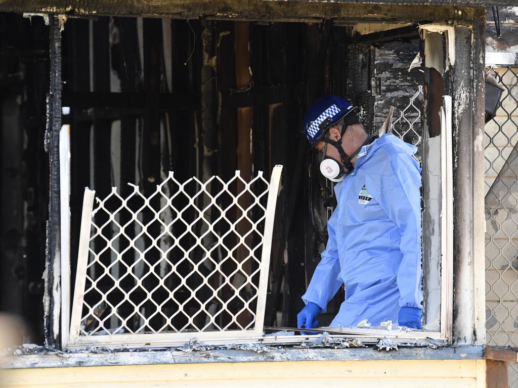 Police investigators at the scene of a fatal house fire in Harristown, Wednesday, May 7, 2025. Picture: Kevin Farmer