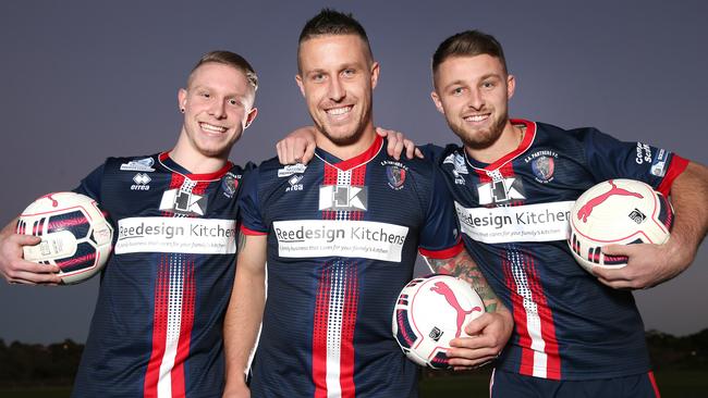 Alex Riedout (right) has been reunited with his brothers, Jonathon (left) and Phil at South Adelaide Soccer Club. Picture: Stephen Laffer