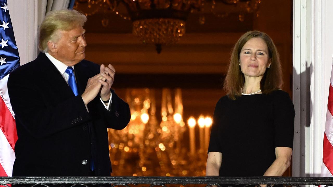 With his third appointee to the Supreme Court, Amy Coney Barrett. Picture: Brendan Smialowski/AFP