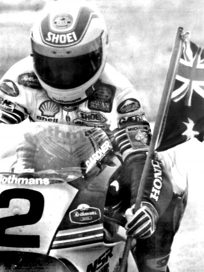 Wayne Gardner celebrates winning the 1989 500cc Motorcycle Grand Prix at Phillip Island. Pic Ross Duncan Historical Motor Racing