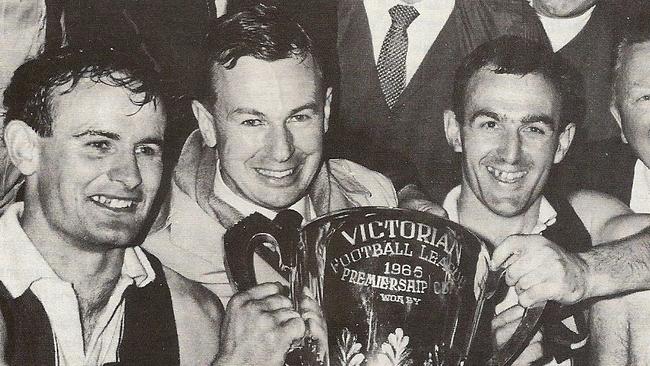 Jack Clarke, John Coleman and Ken Fraser with the premiership cup.