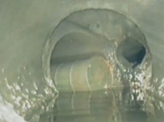 A large drum made its way into one drain at Bowen Hills. Photo: BCC.