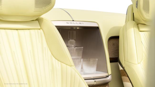 Interior view of Cadillac SOLLEI concept vehicle with Sunburst Motif pattern seats and crystal glass accessory inside integrated beverage chiller. Picture: GM DESIGN