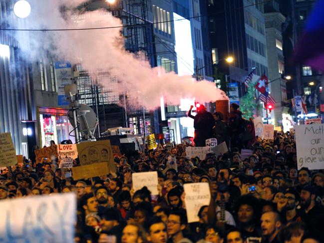 People take part in a protest against President-elect Donald Trump in New York City on November 9, 2016. Picture: AFP
