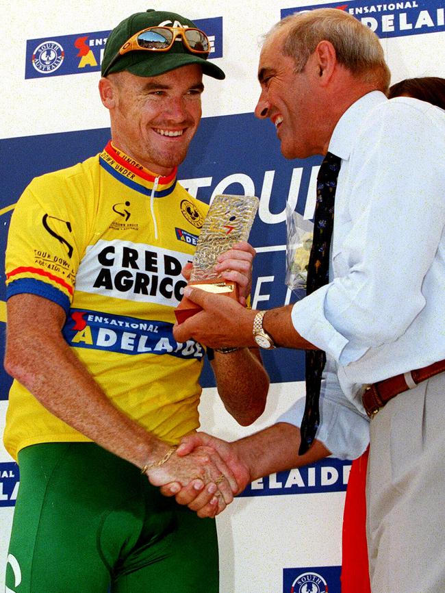 Cyclist Stuart O'Grady with then SA Premier John Olsen after winning the inaugural Tour Down Under race.