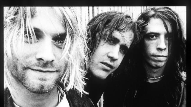 Dave Grohl (right) with his Nirvana bandmates Kurt Cobain (left) and Krist Novoselic (centre). Picture: supplied