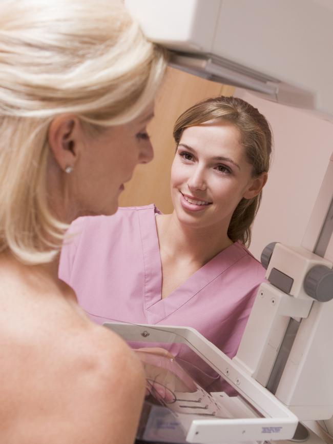 Gold Coast Bulletin - Time for Life - Queensland Health. Nurse Assisting Patient Undergoing Mammogram In General Practise