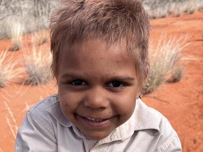 The Central Land Council took Mutitjulu School students on several outback excursions to look for tracks, burrows and bush foods. Picture: Department of Education