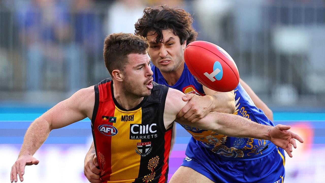 PERTH, AUSTRALIA - JULY 02: Jack Higgins of the Saints and Tom Barrass of the Eagles contest for the ball during the round 16 AFL match between West Coast Eagles and St Kilda Saints at Optus Stadium, on July 02, 2023, in Perth, Australia. (Photo by Paul Kane/Getty Images)