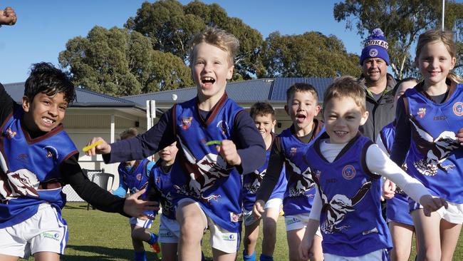 Kenilworth Football Club - Budget case study story talking about investment in sports facilities and initiatives to help fund participation. Daniel (Buddha) De Lawyer the new junior president, and coach of the Under 7 Blue Kookaburras, with (players included) Ivraj, Micheal (correct spelling), Xavier, Brodie, Maddox, Max, Lewis, Violet, Harper and Jagger. 2 June, 2024. Picture Dean Martin