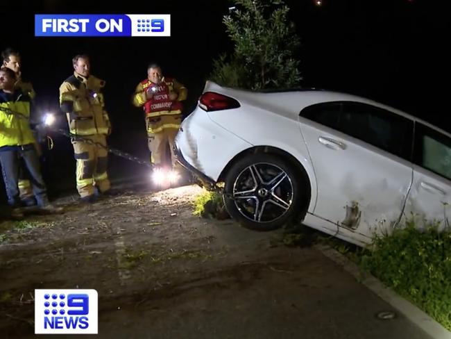 Her Mercedes was towed back up the embankment. Picture: 9 News