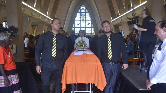 The outgoing pallbearers included Lachlan Costa, Daniel Costa, Patrick Heenan, Manuel Brown, Cyril Rioli Jnr, Jeremy Rioli, Ernie Williams, and Allan Henderson at Mr Costa’s state funeral. Picture: Sierra Haigh