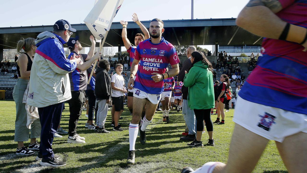 Alexandria Rovers run onto the field. Picture: John Appleyard