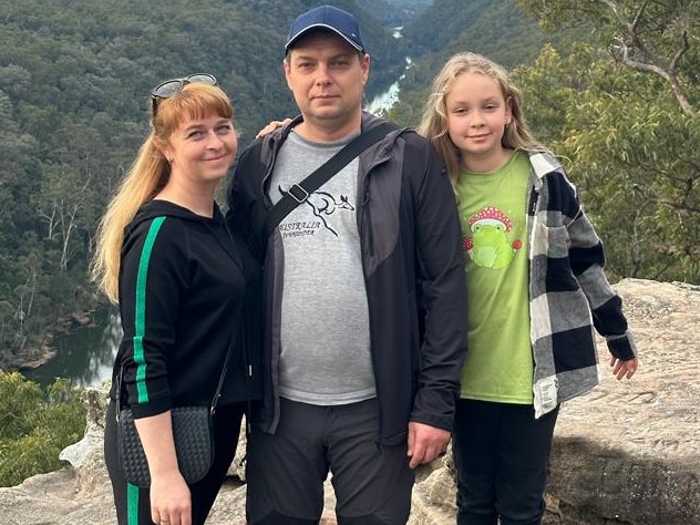 Denys Levchenko and his wife Olha and his daughter Diana.