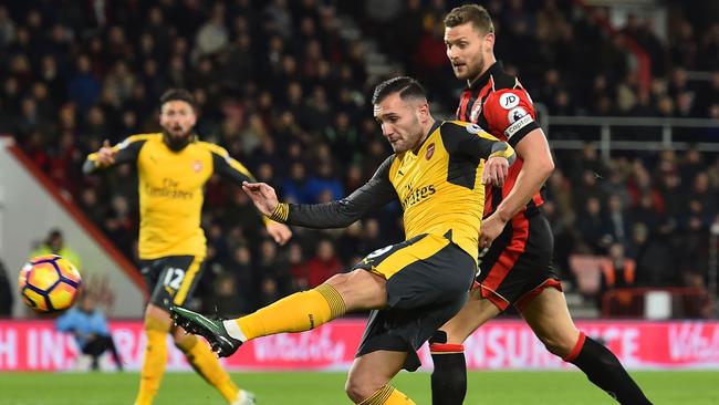 Arsenal's Spanish striker Lucas Perez shoots to score.
